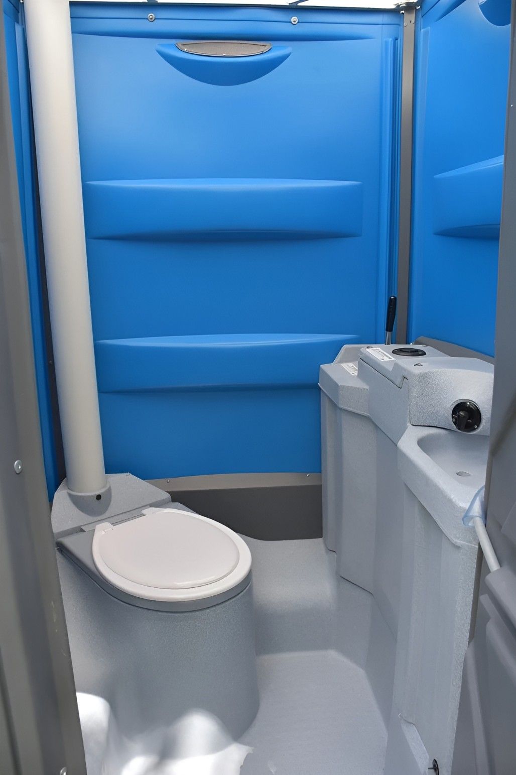 A Portable Toilet With a Toilet, Sink and Mirror — Proserpine Septic Service In Proserpine, QLD