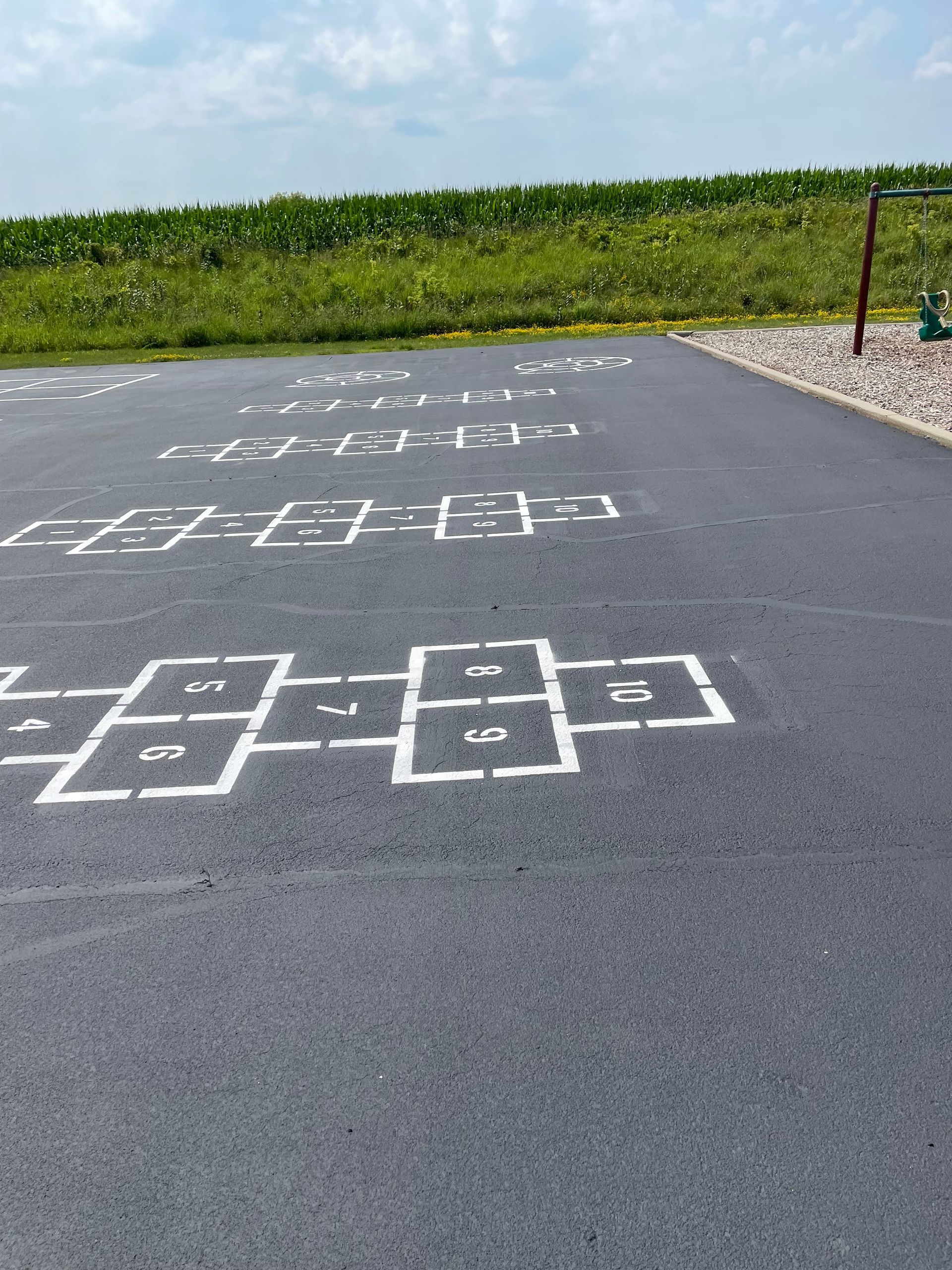 A Parking Lot with Hopscotch Drawn on It | Owatonna, MN | Seykora Striping