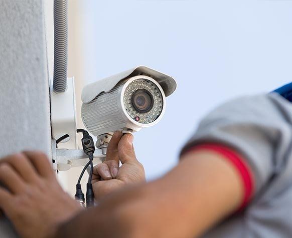 Professional CCTV Technician Working — CCTV Installations in Muswellbrook, NSW