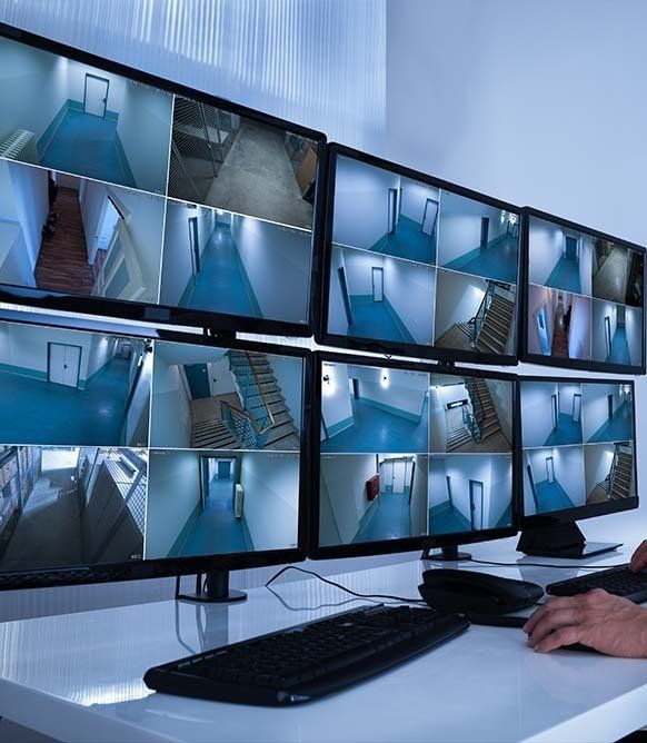 Operator Looking at CCTV — Security Systems in Muswellbrook, NSW