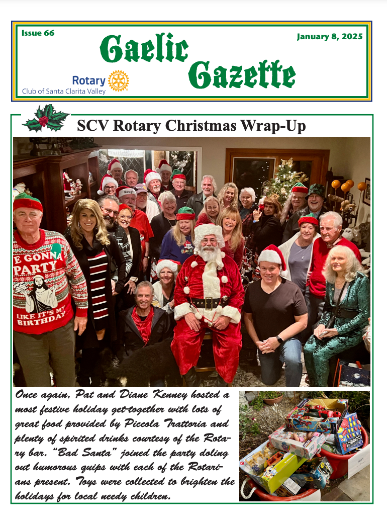 A group of people are posing for a picture with santa claus.