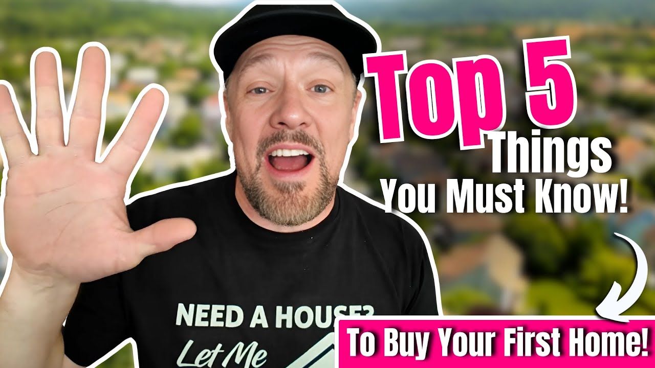 A man is wearing a black shirt that says need a house let me to buy your first home.