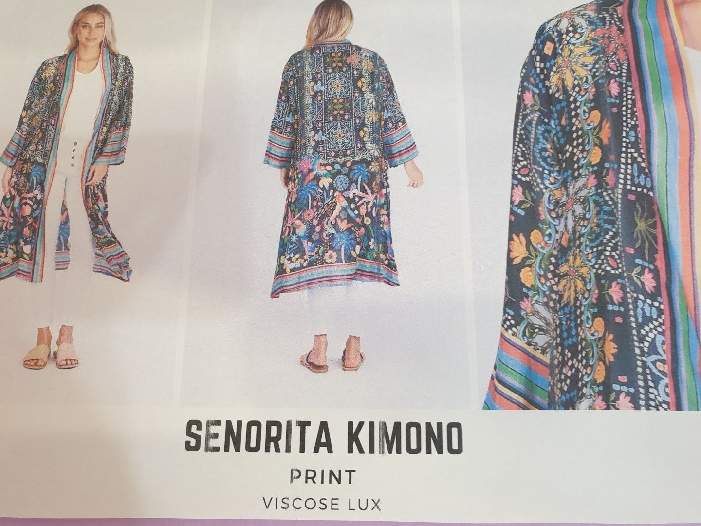 Sendrita Kimono in dark floral print; front, back, and detail view. Model wears it over white pants and top.
