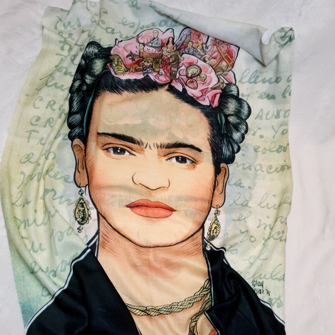 Frida Kahlo portrait on fabric, wearing a floral headdress and necklace.