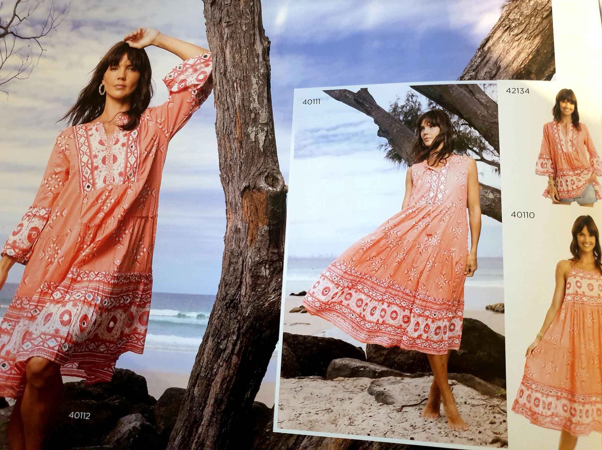 Woman in coral dress on beach, leaning against a tree, smiling. Two other coral dresses are shown in the same style.