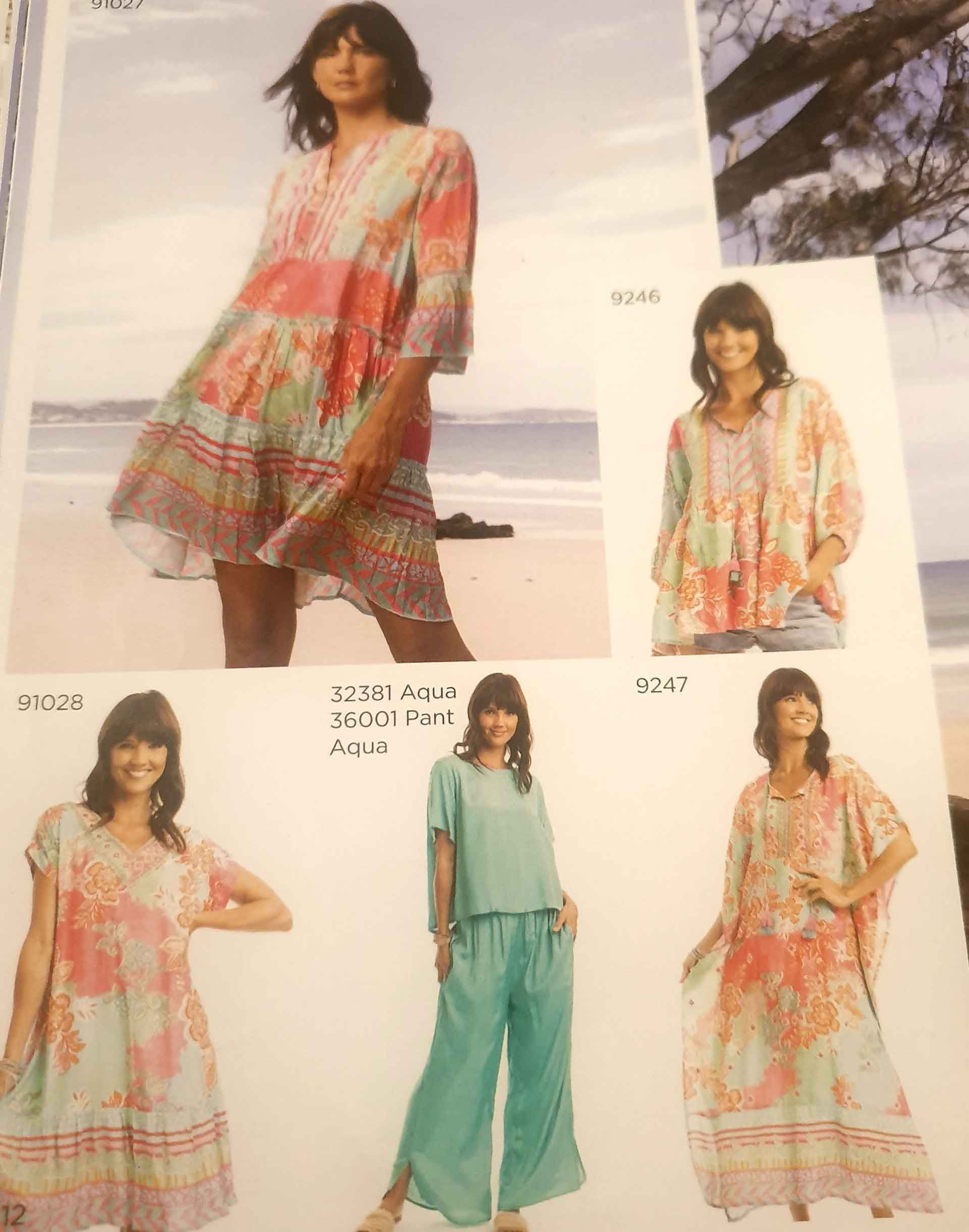 Women modeling colorful boho-style clothing on a beach: dresses, tops, and pants in pastel colors.