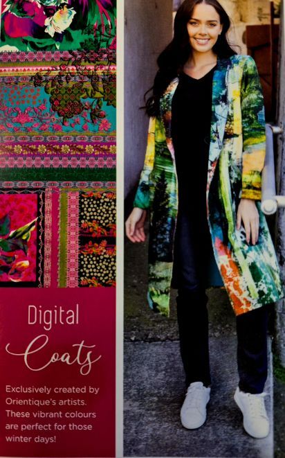 Woman wearing a colorful digital print coat, dark jeans, and white sneakers. Advertisement promoting the coats.