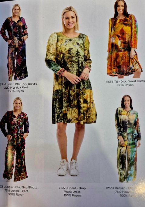 Women modeling colorful printed dresses and jumpsuit in a catalog.