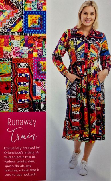 Woman wearing a long, colorful patterned dress, smiling, standing, hands in pockets; next to a matching fabric swatch.