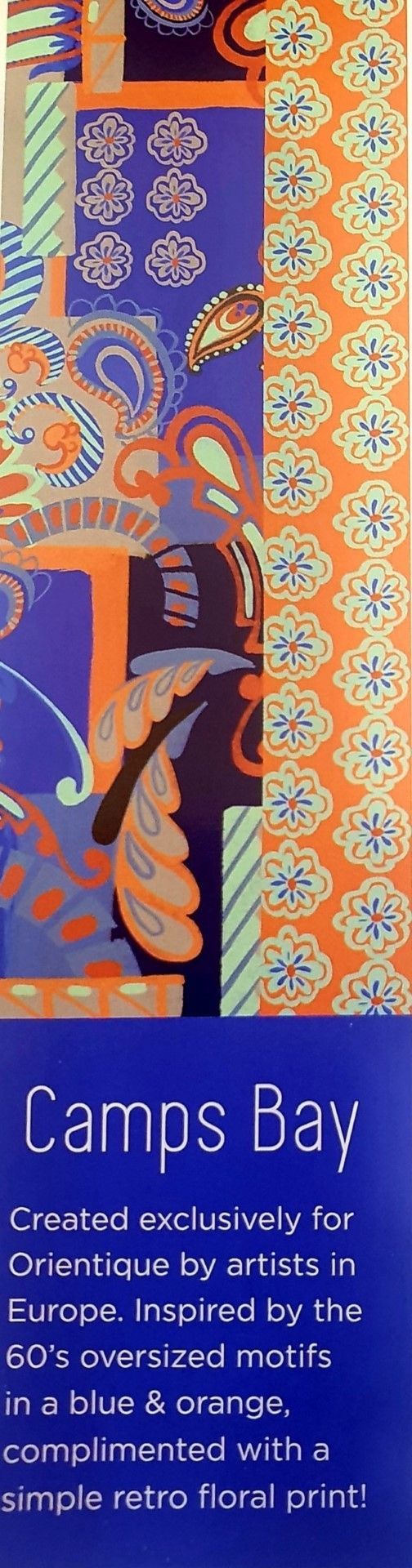 Camps Bay textile pattern in blue and orange with floral and paisley motifs.