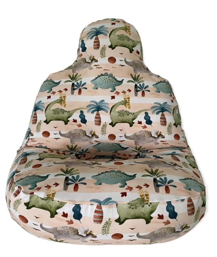 A snoezi chair with a pattern of dinosaurs and palm trees on it