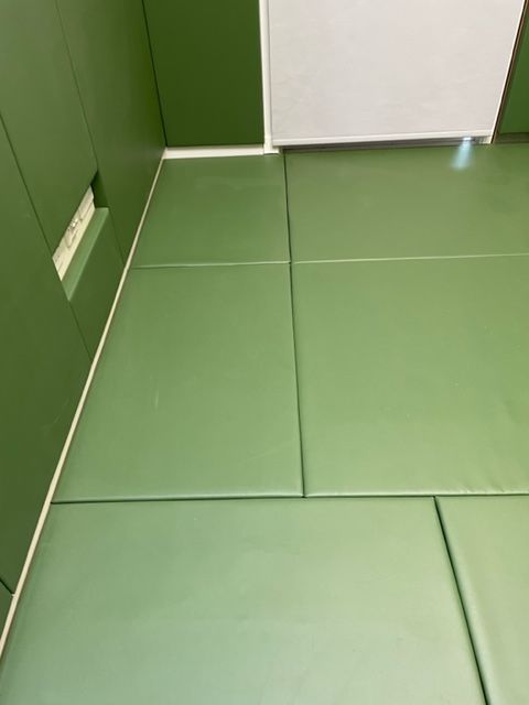 green padded floor
