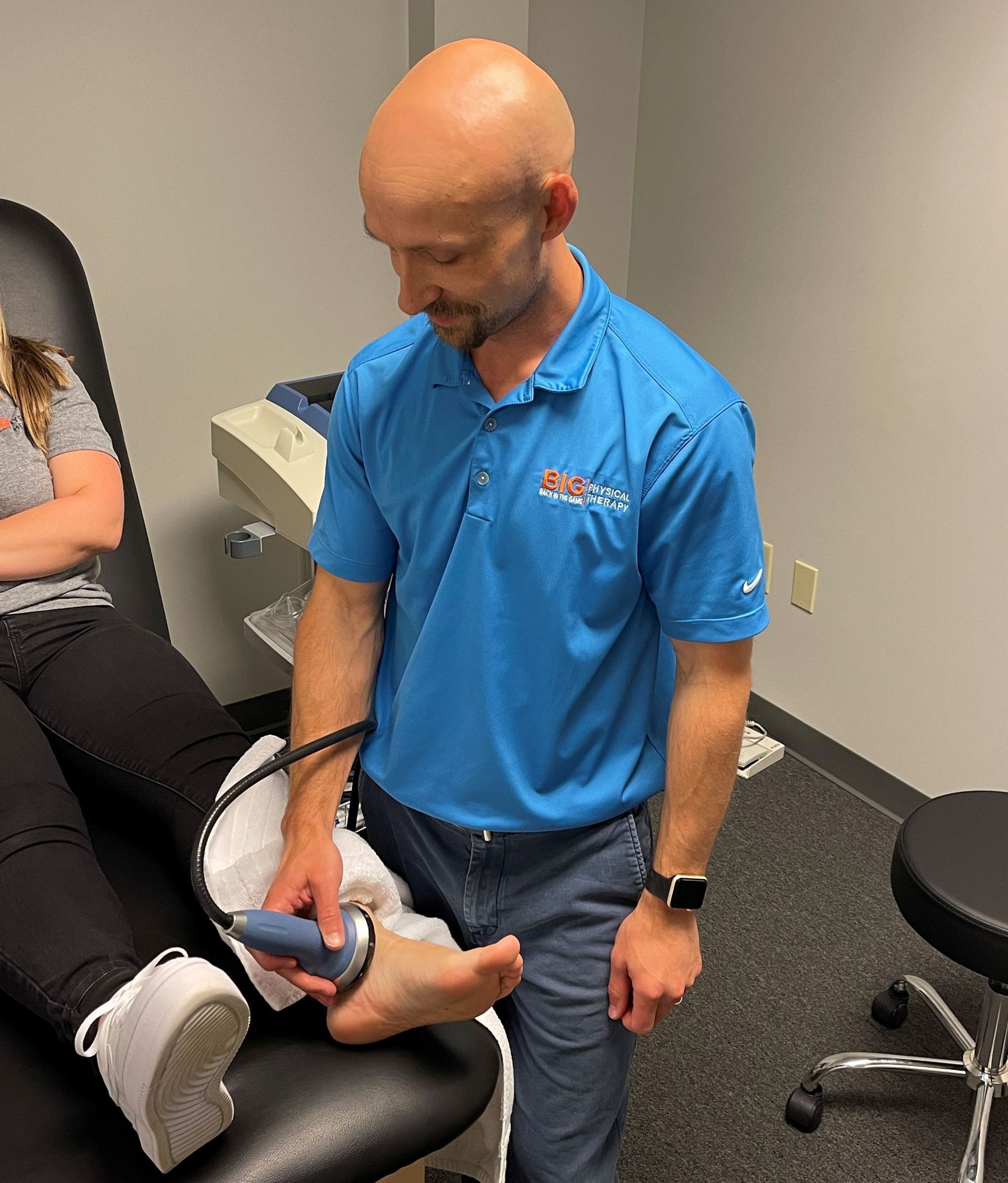 physical therapist providing treatment following a common pickleball injury