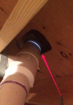 A red arrow points to a hole in the ceiling