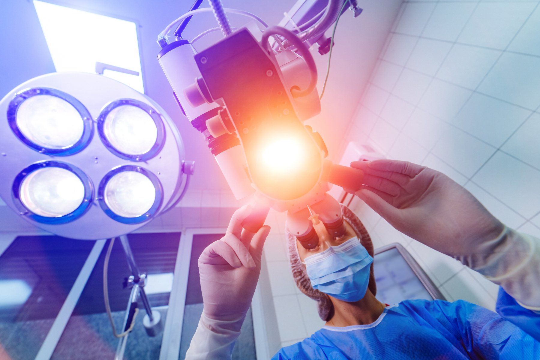 surgeon positions overhead light before surgery