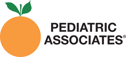 The logo for pediatric associates is an orange with green leaves.