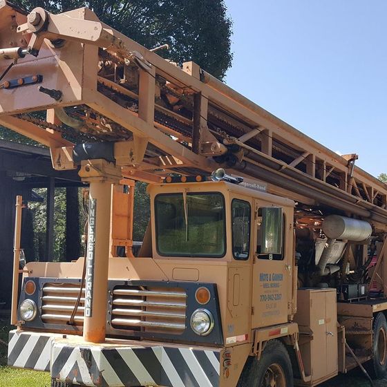 Well Drilling — Yellow Drilling Truck in Temple, GA