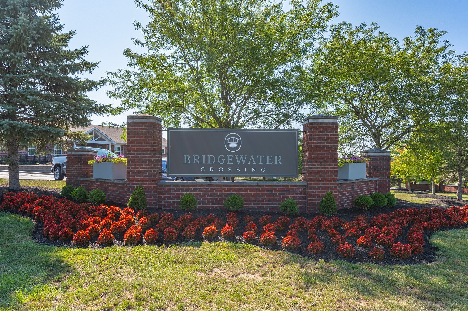 Bridgewater Crossing apartment community entrance sign with landscaping