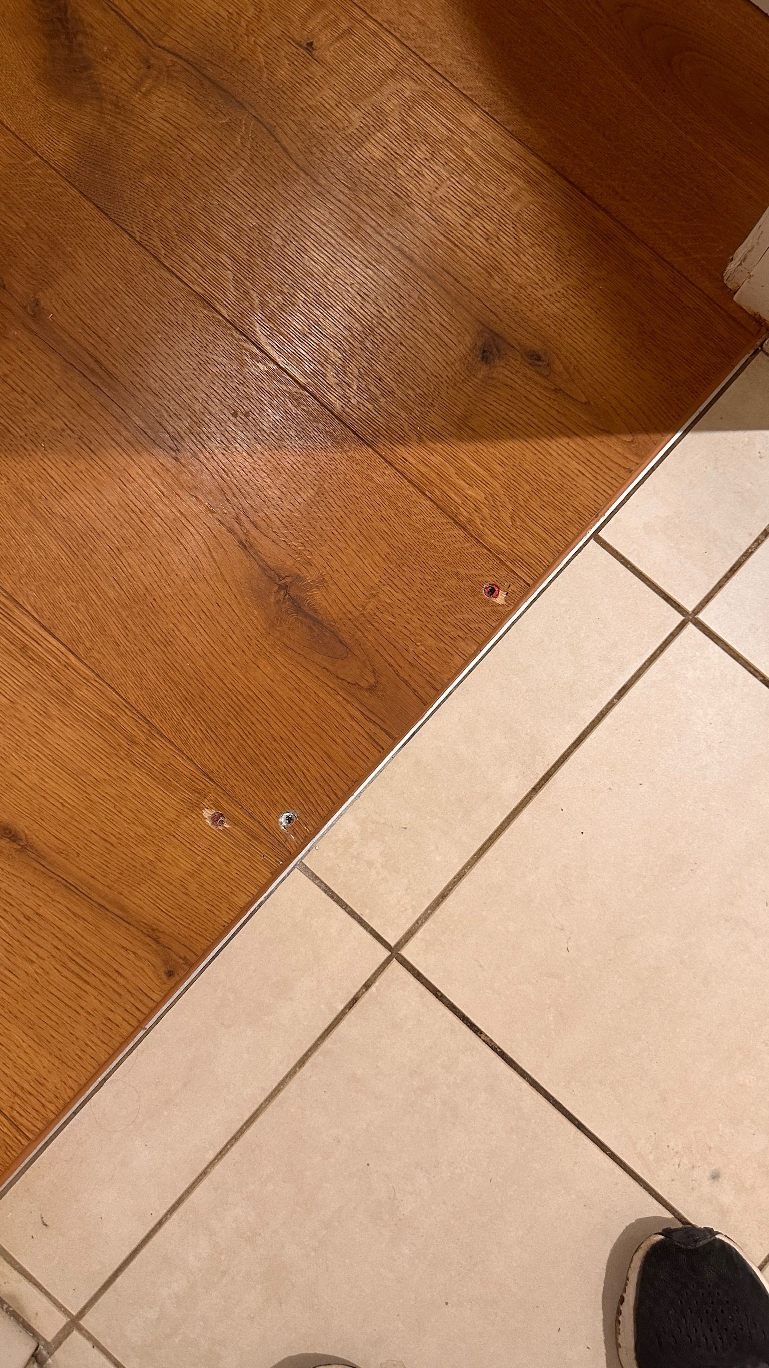 Timber floor repaired — before and after comparison