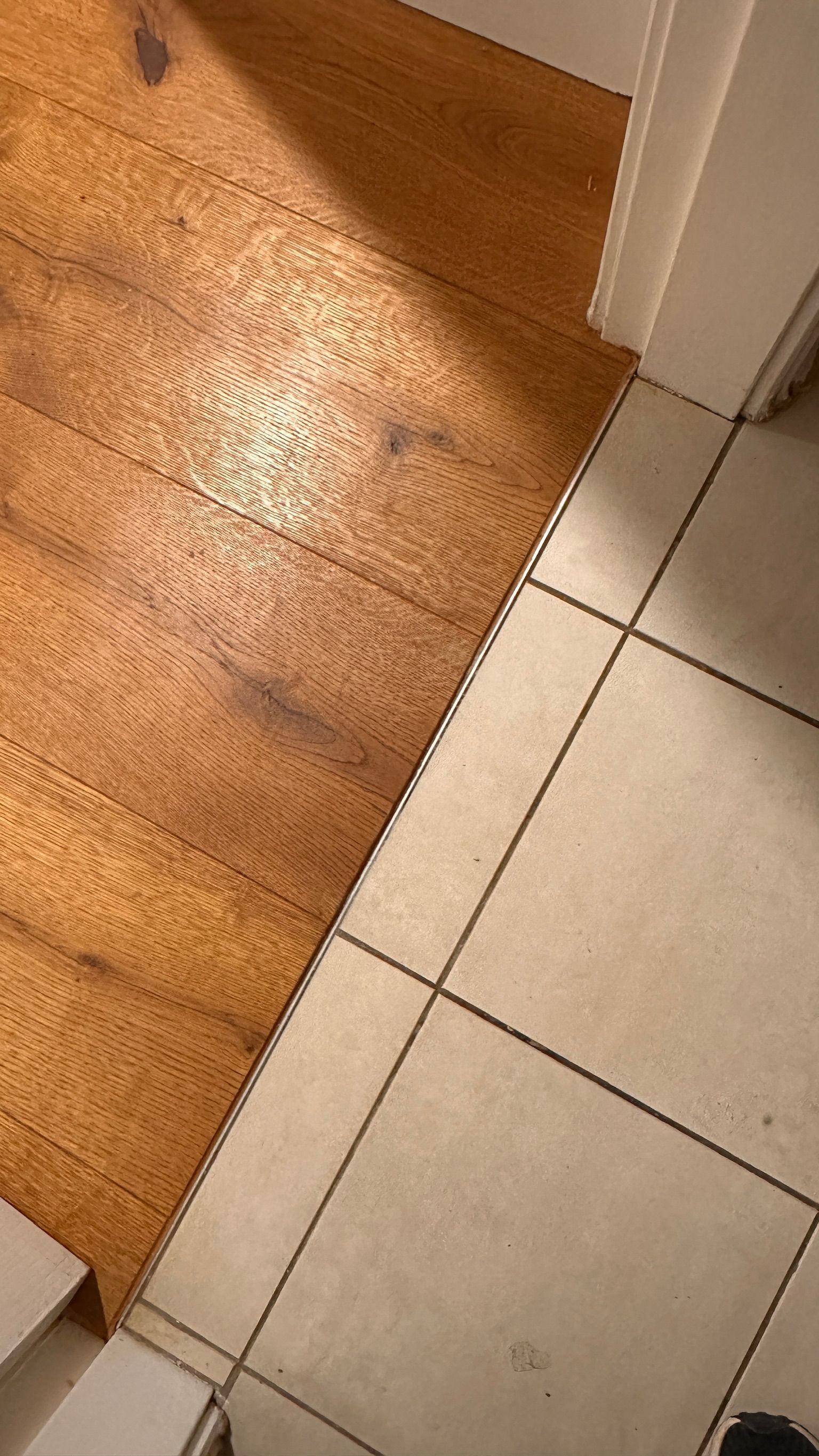 Timber floor repaired — before and after comparison