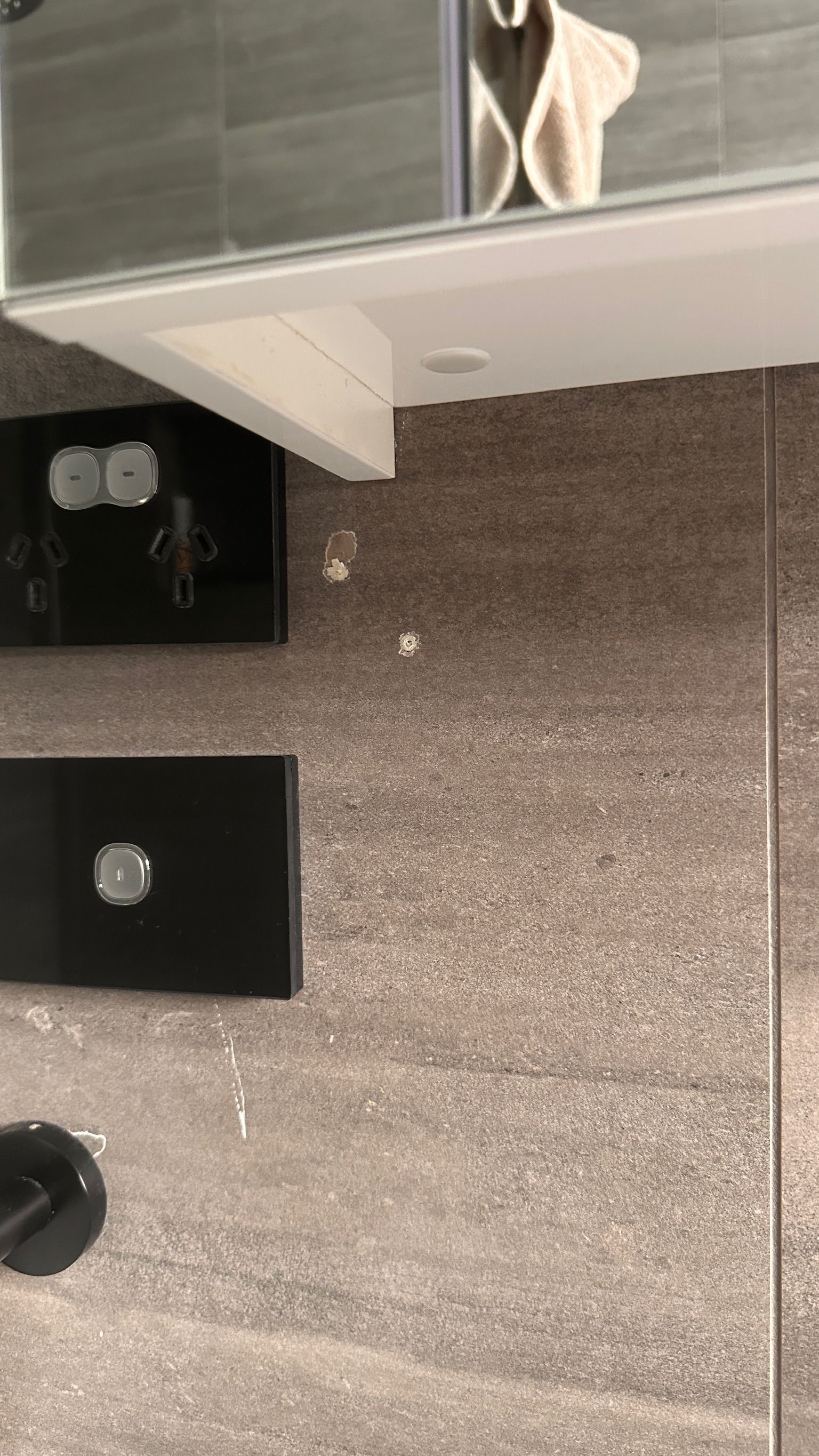 Tile wall repaired — before and after comparison