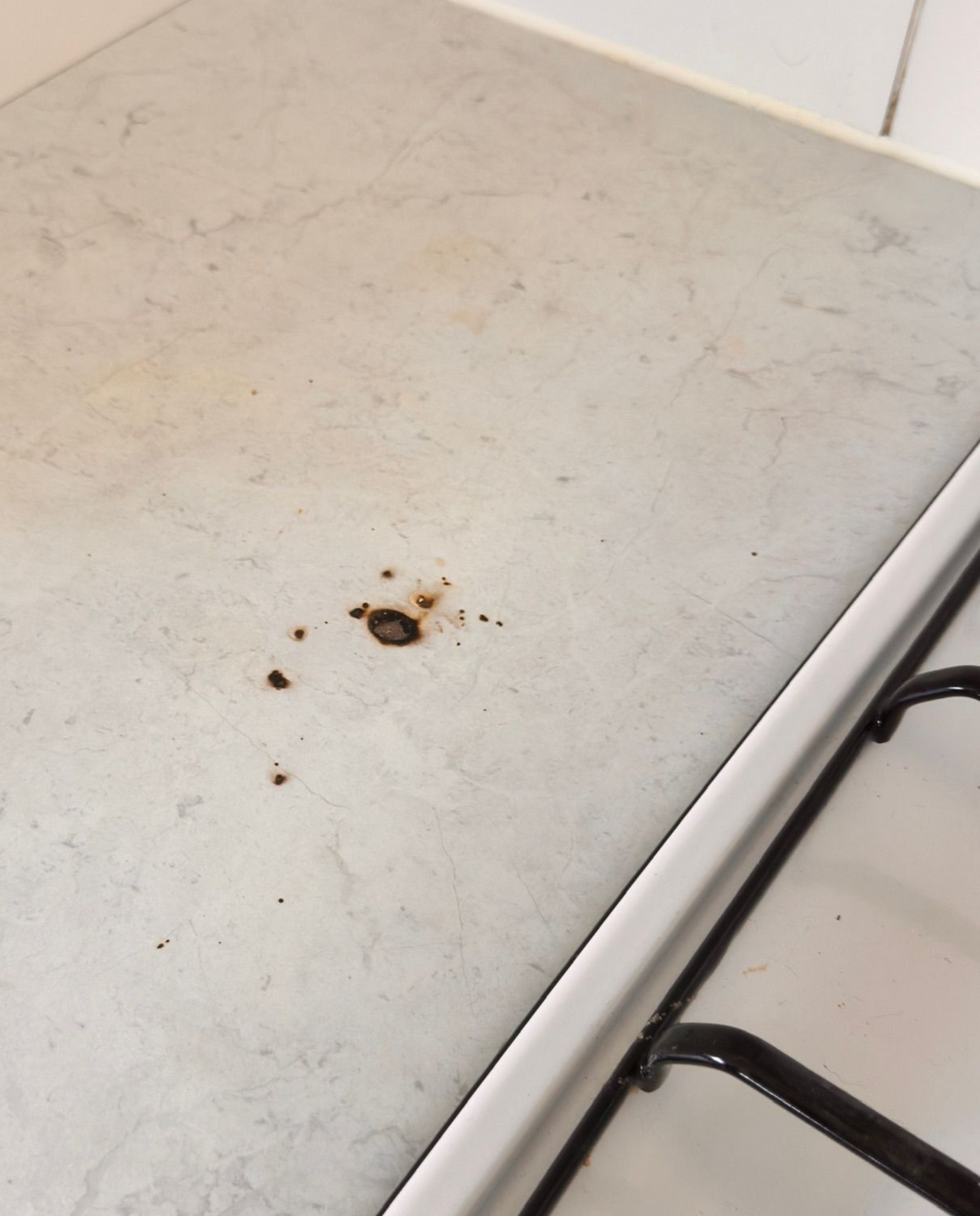 Laminate benchtop repaired — before and after comparison