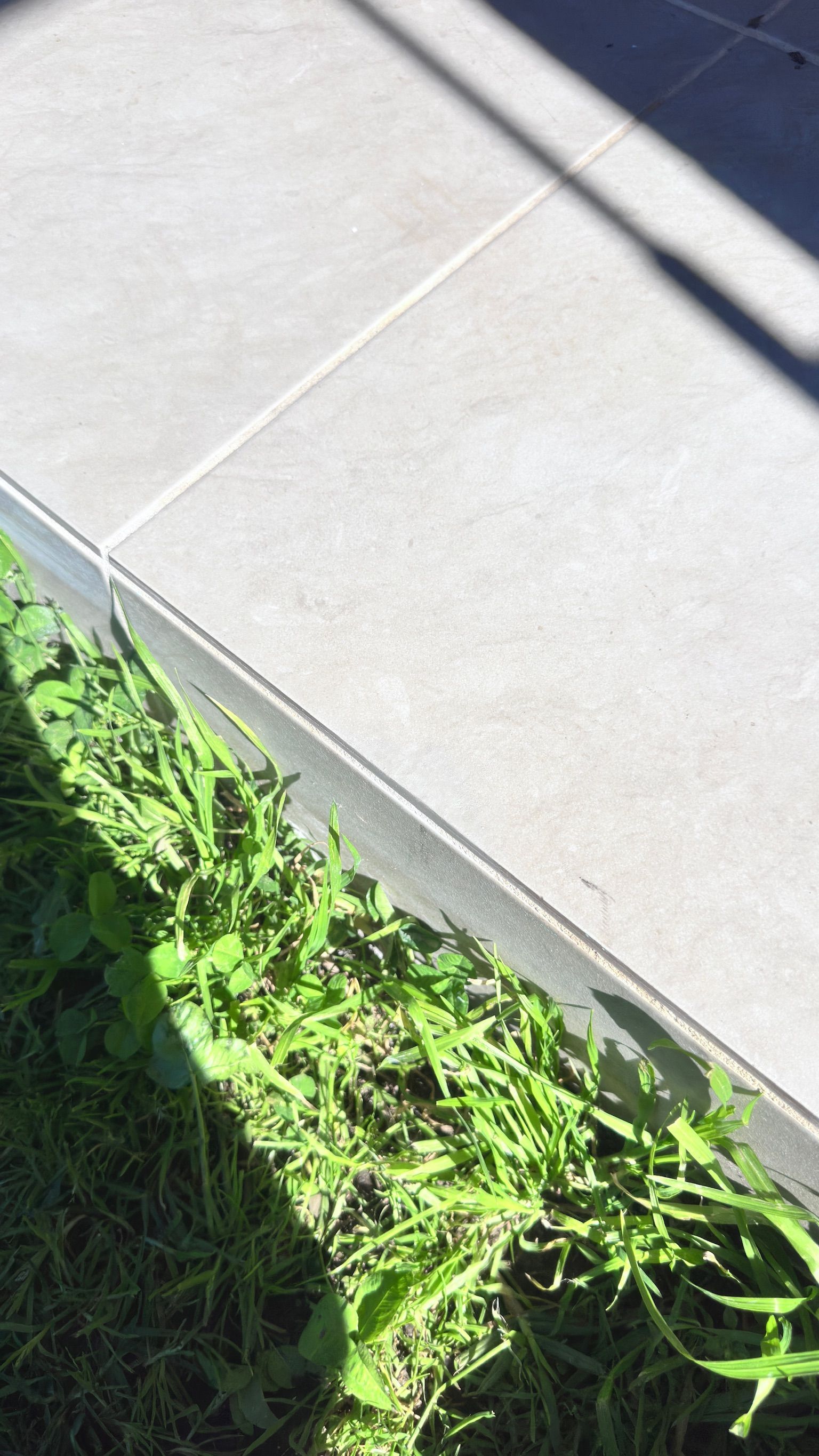 Tile floor repaired — before and after comparison