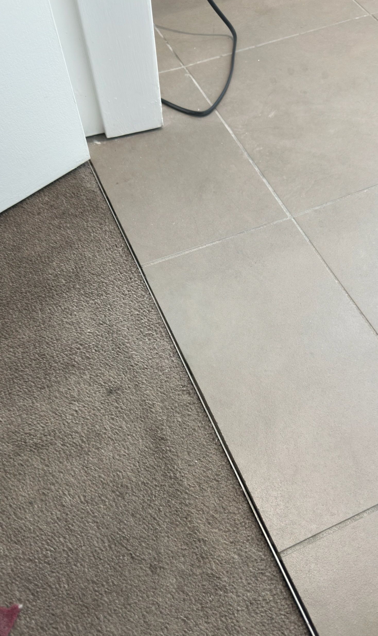 Tile floor repaired — before and after comparison