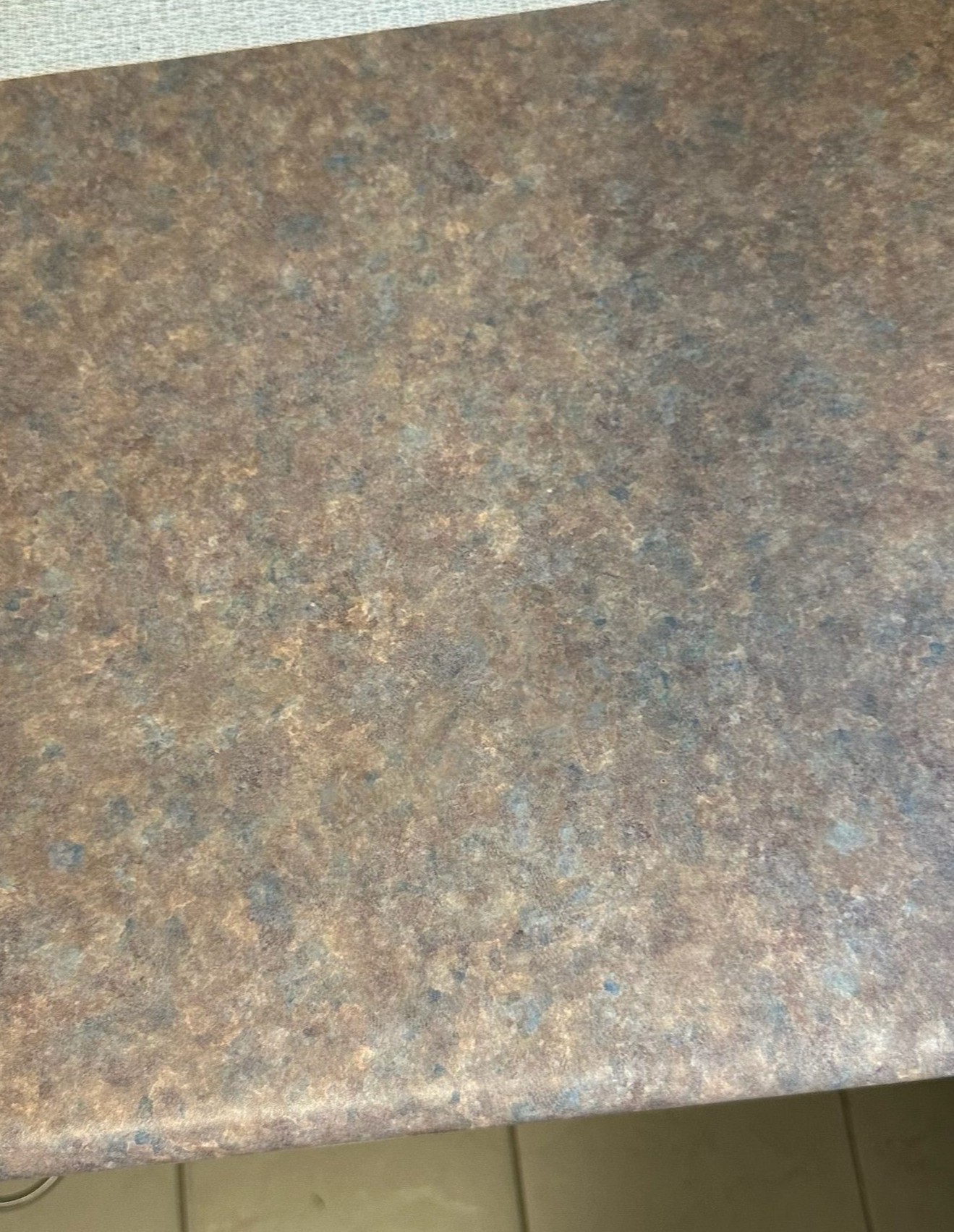 Laminate benchtop repaired — before and after comparison