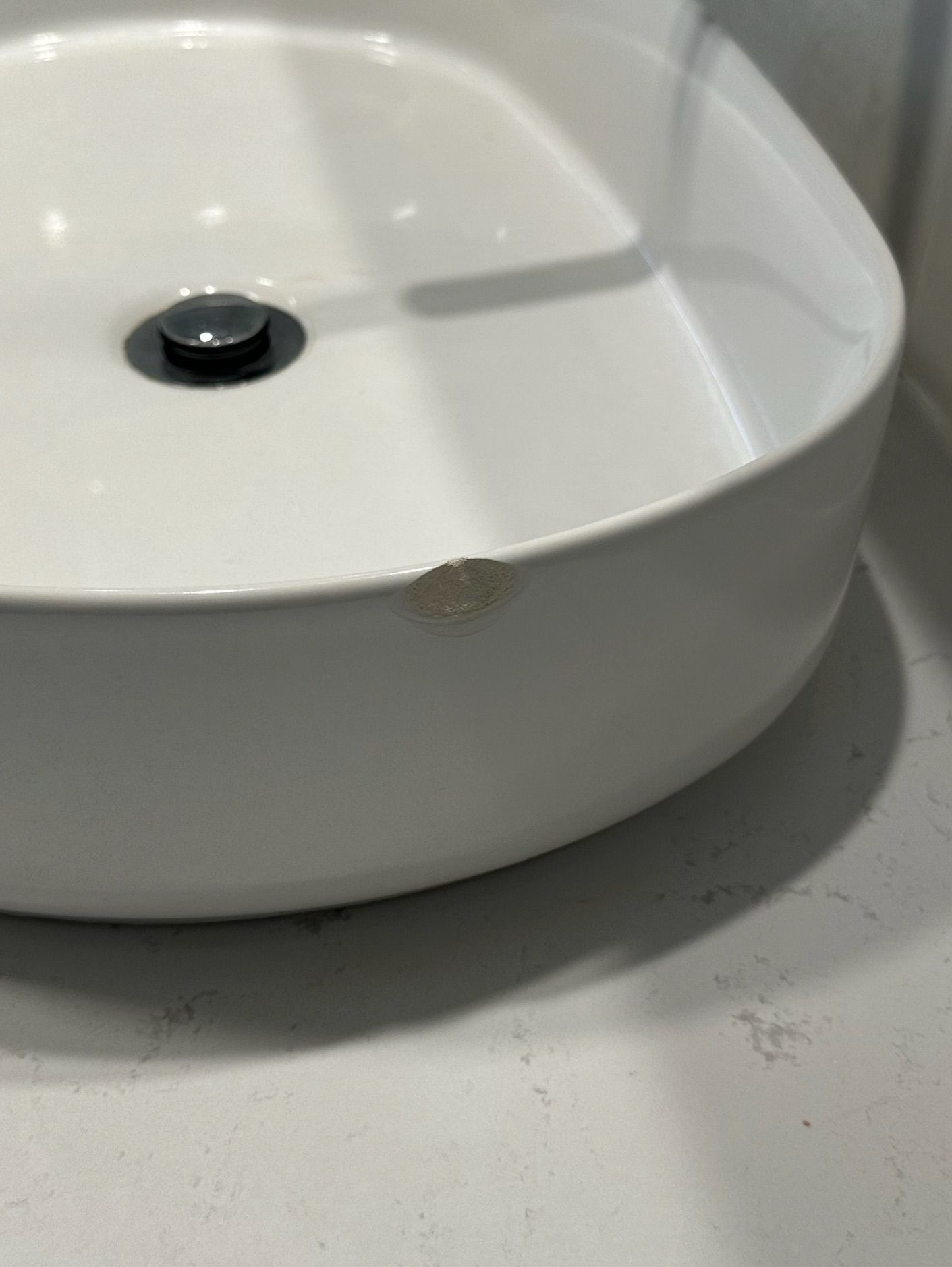 Bathroom ceramic sink repaired — before and after comparison