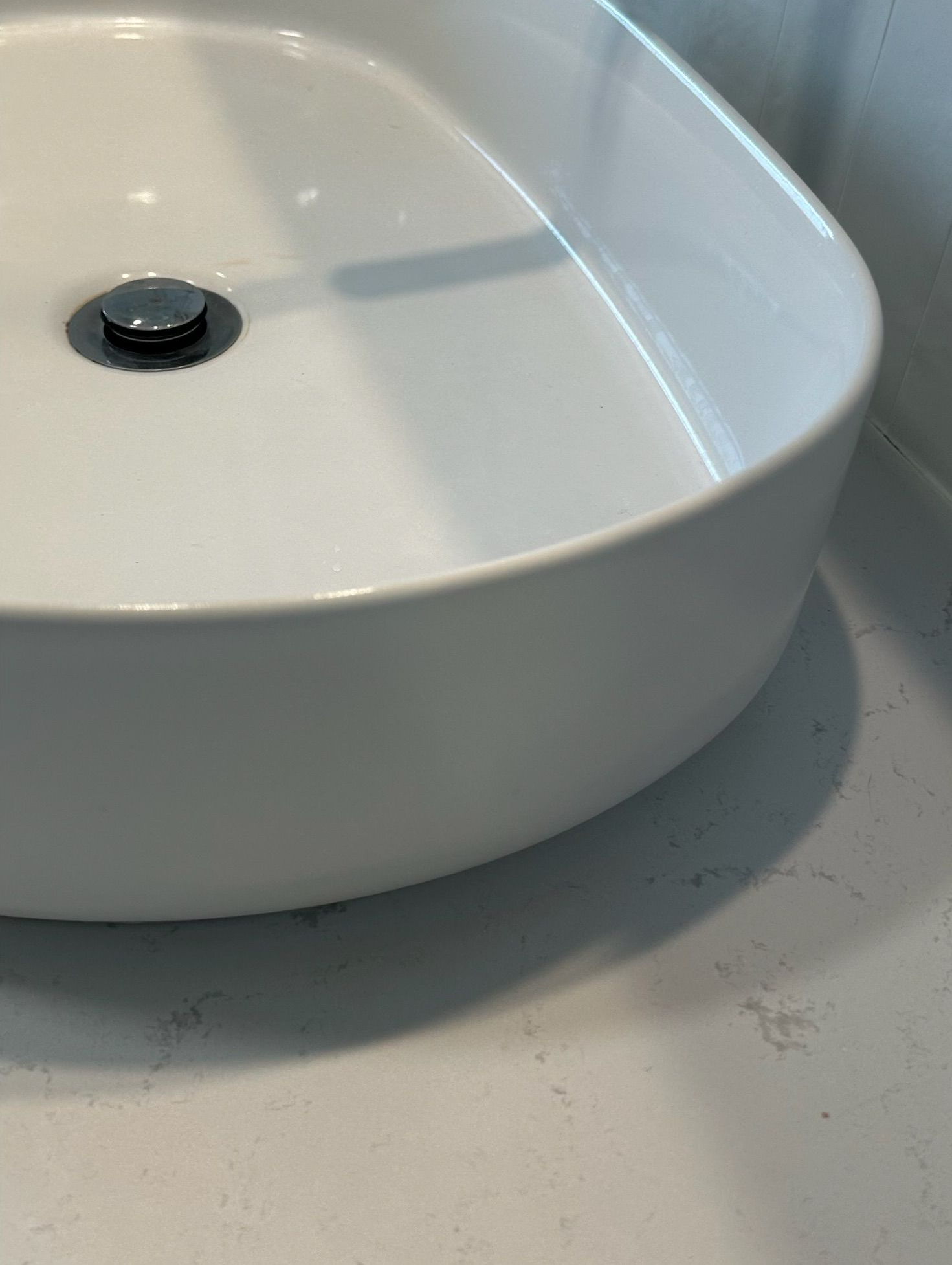 Bathroom ceramic sink repaired — before and after comparison