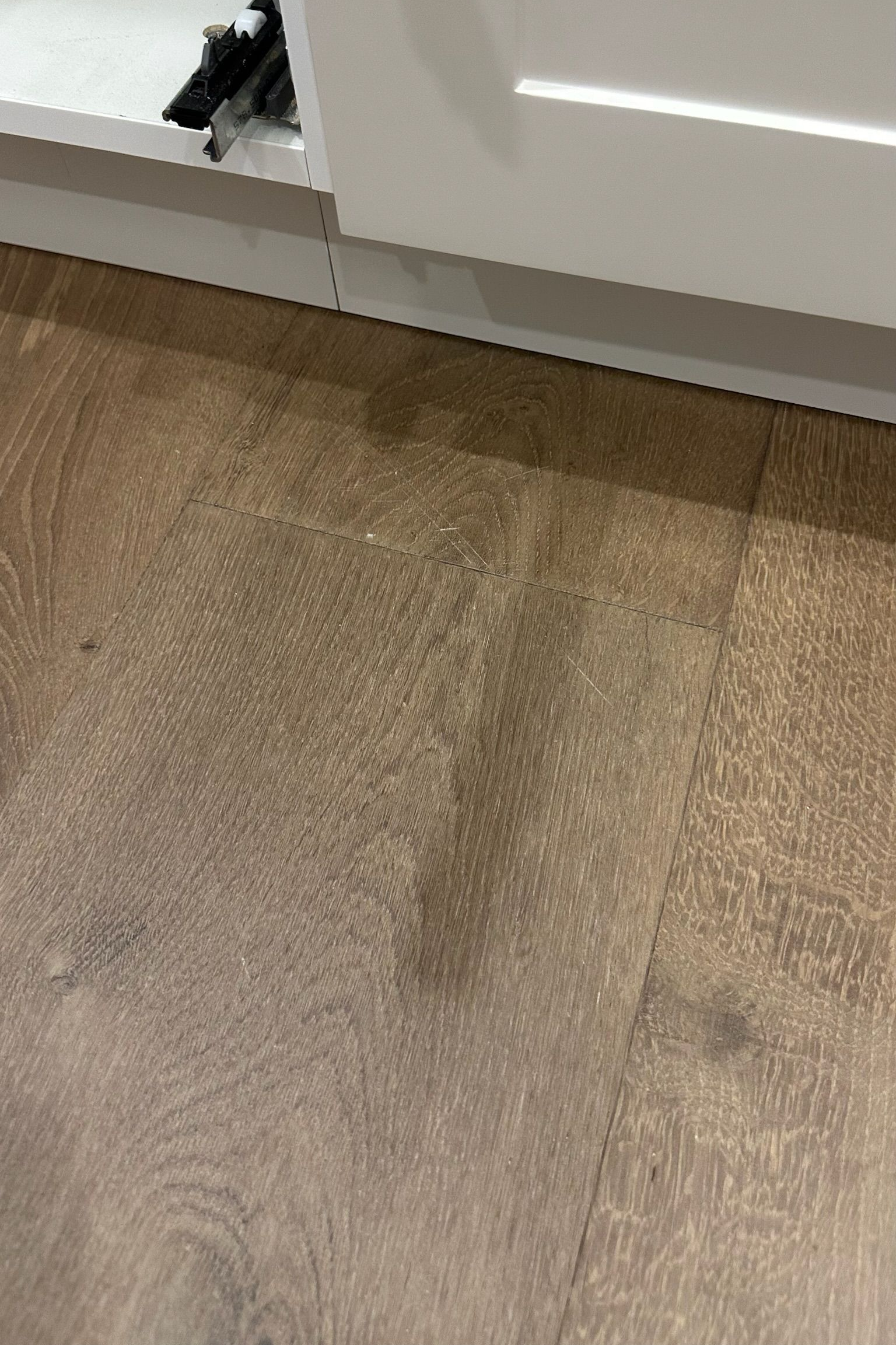 Engineer timber floor repaired — before and after comparison
