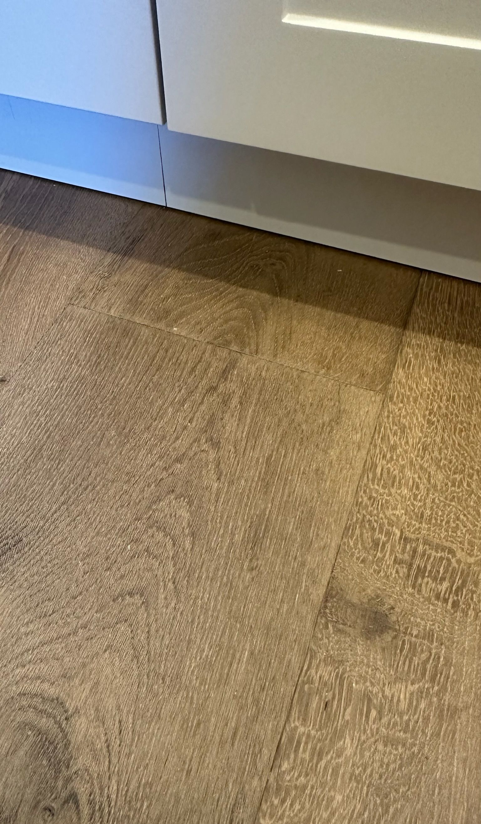 Engineer timber floor repaired — before and after comparison