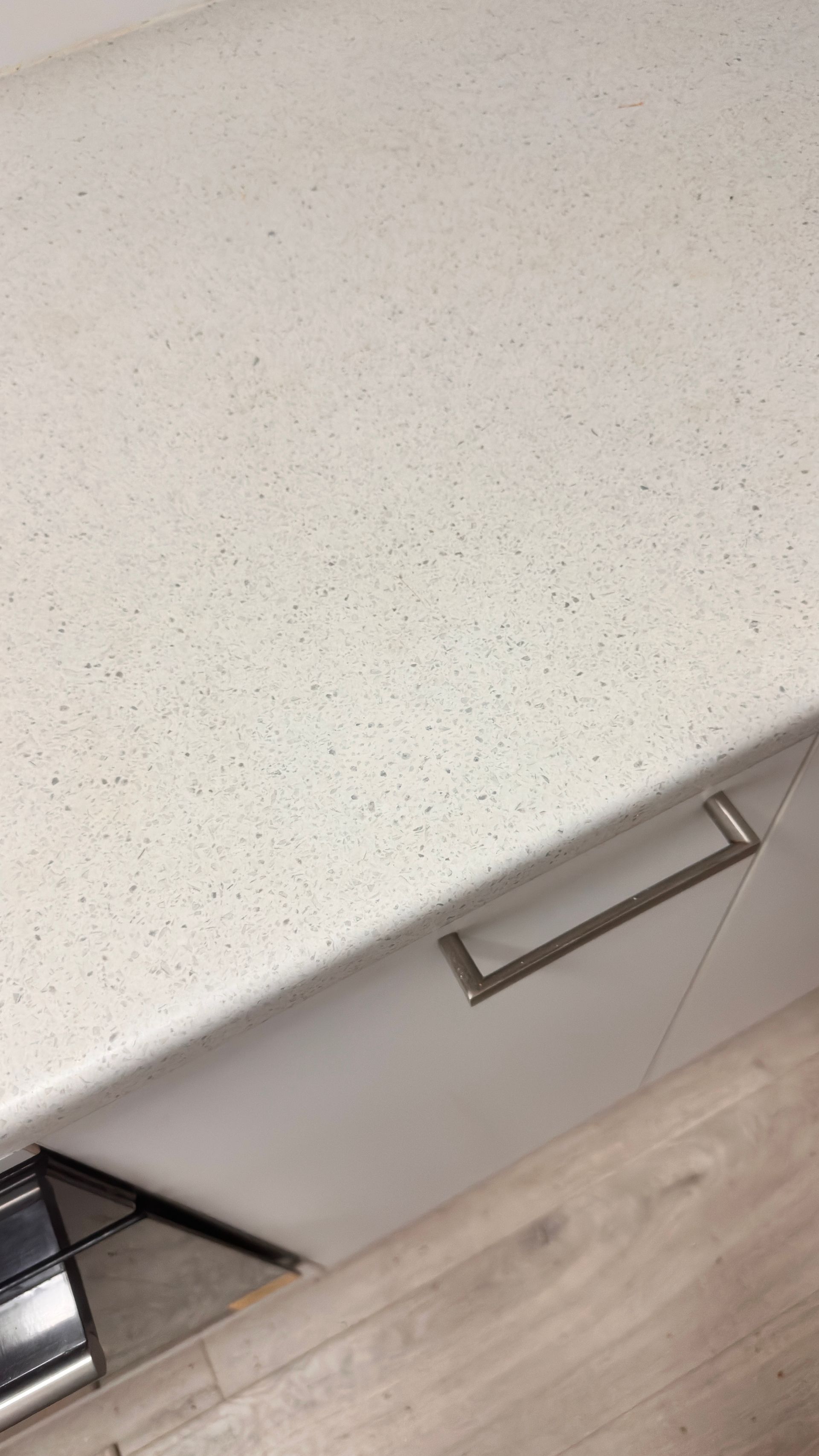 Laminate benchtop repaired — before and after comparison