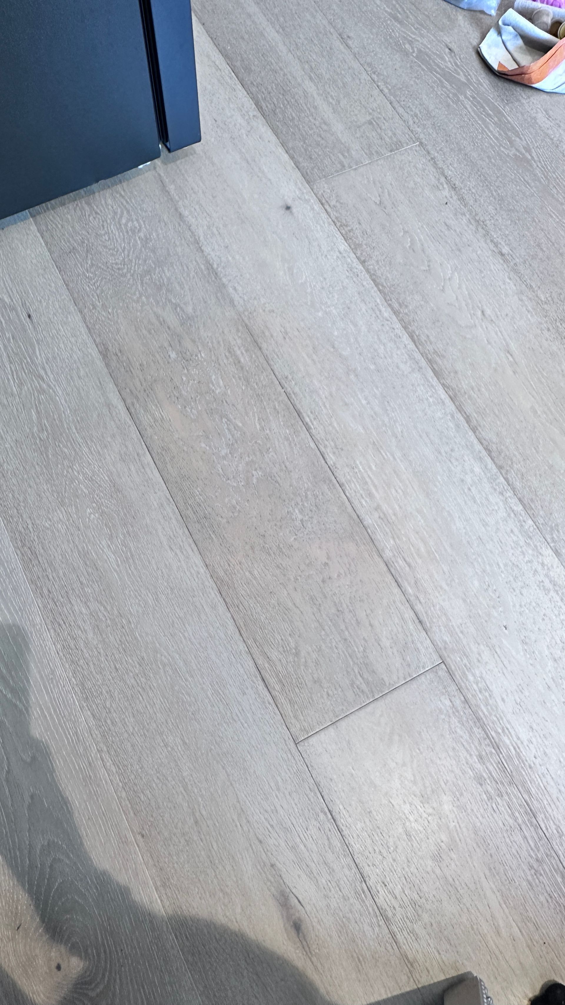 Timber floor repaired — before and after comparison