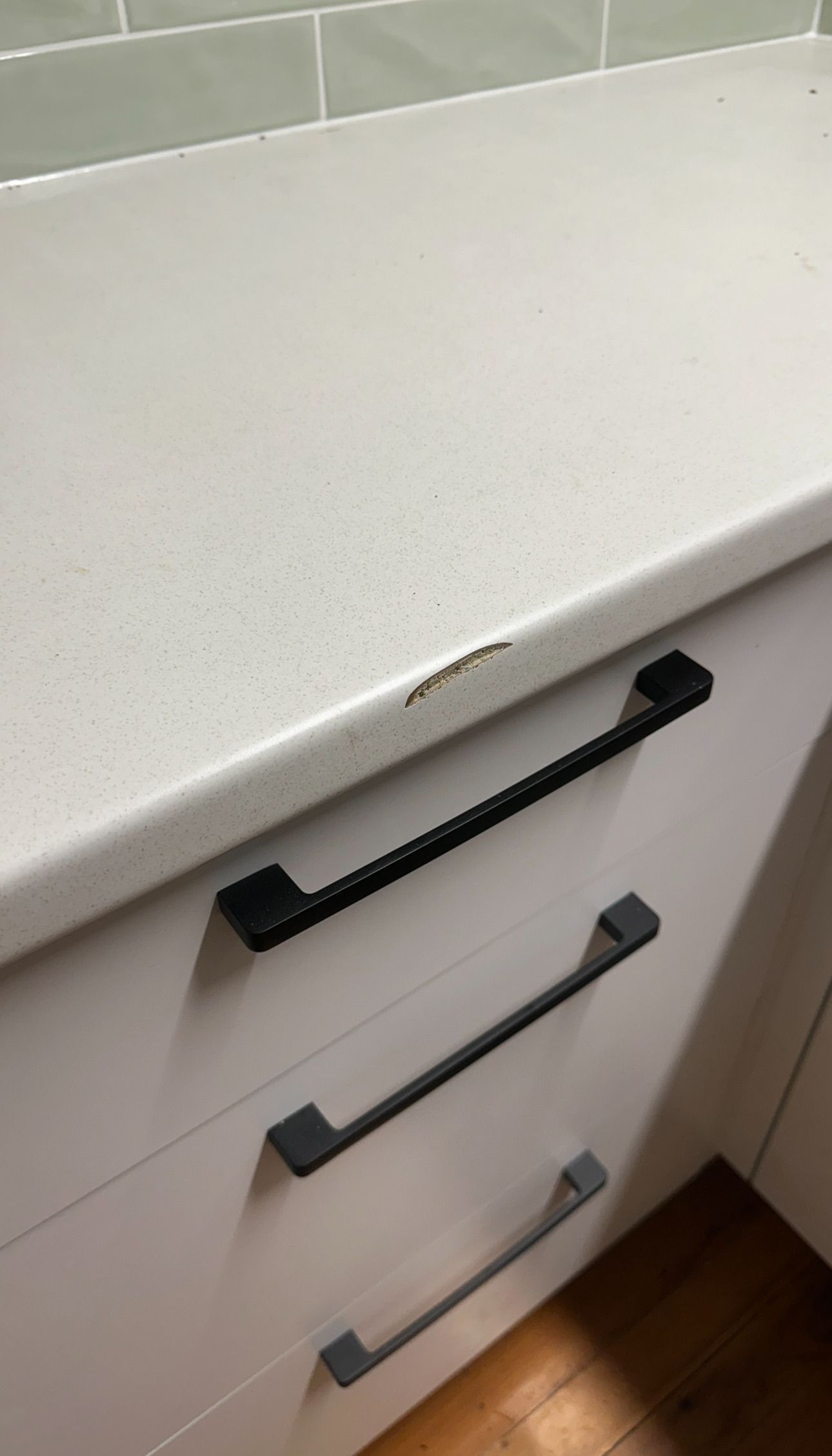 Laminate benchtop repaired — before and after comparison