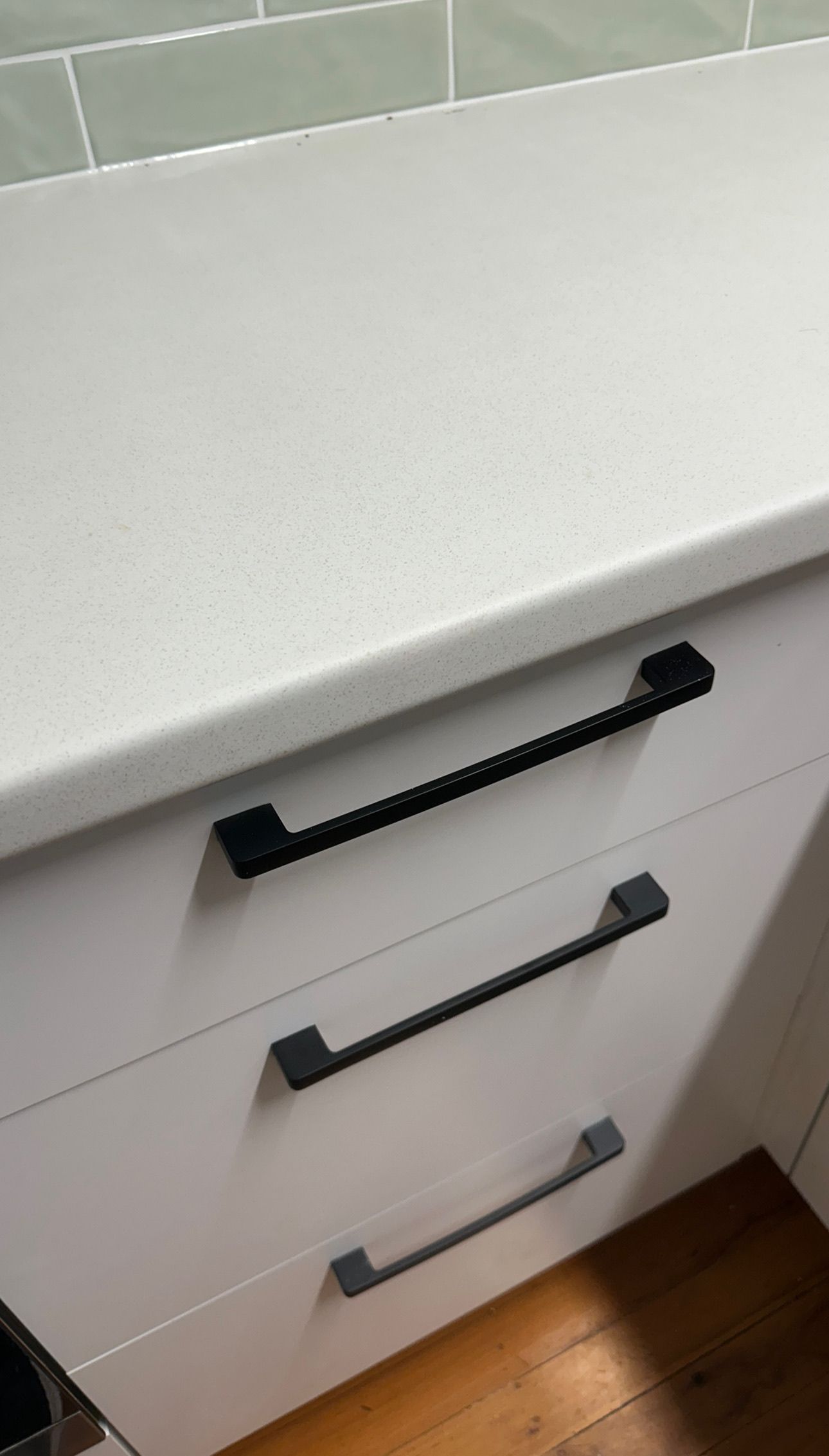 Laminate benchtop repaired — before and after comparison