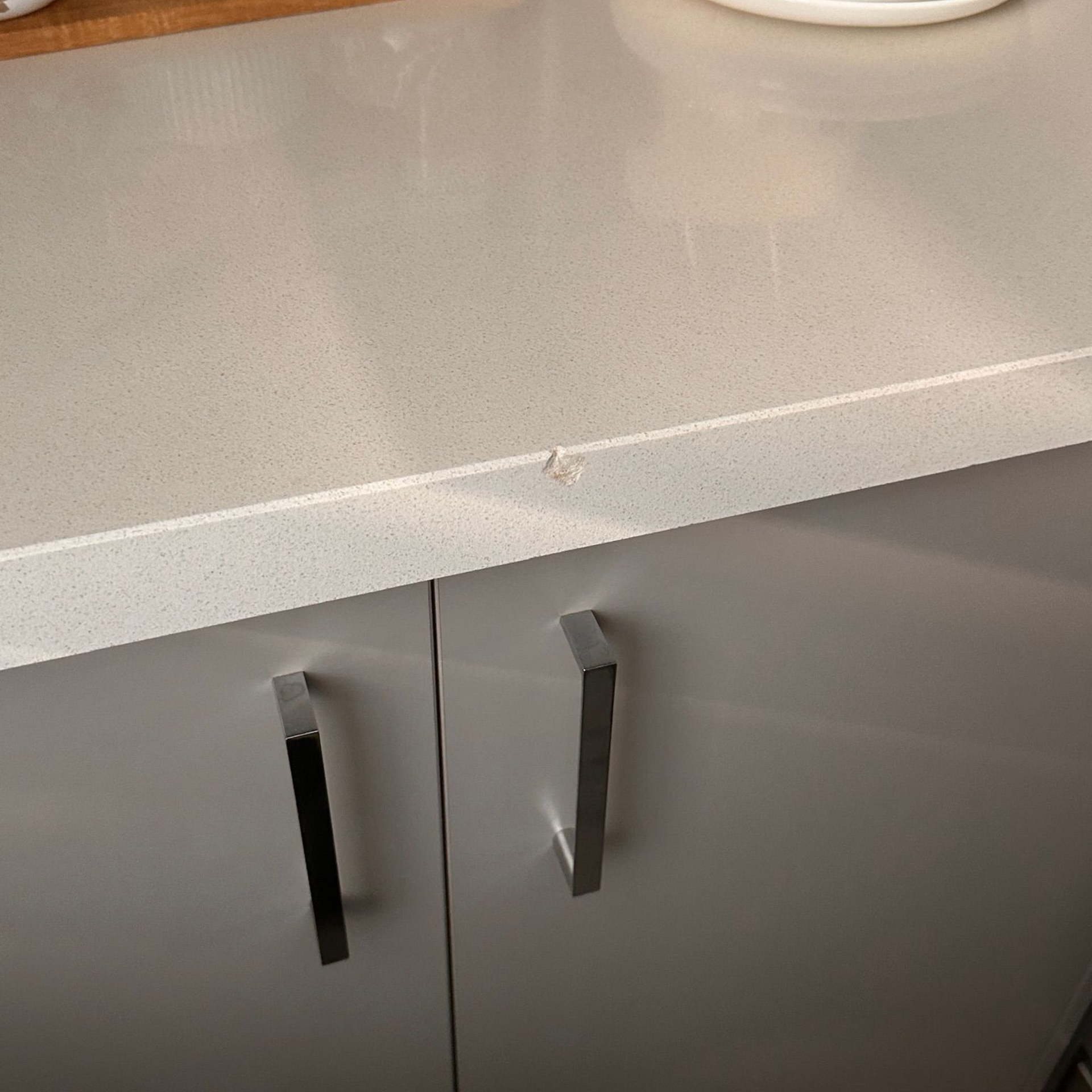 Engineer benchtop floor repaired — before and after comparison