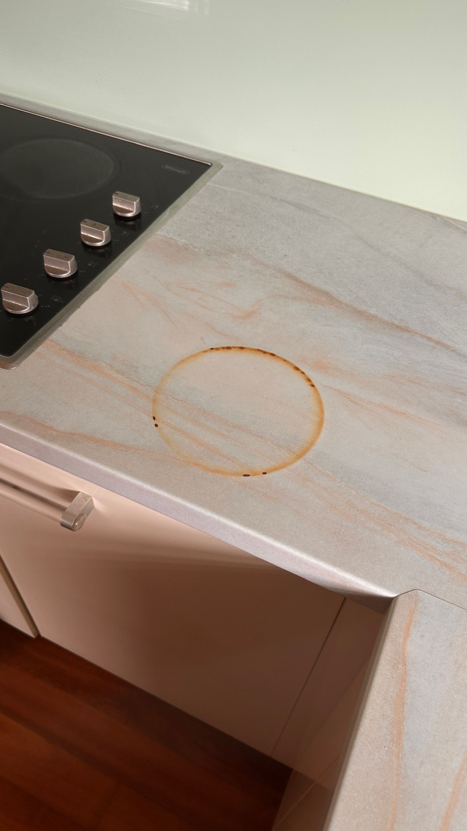 Laminate benchtop repaired — before and after comparison