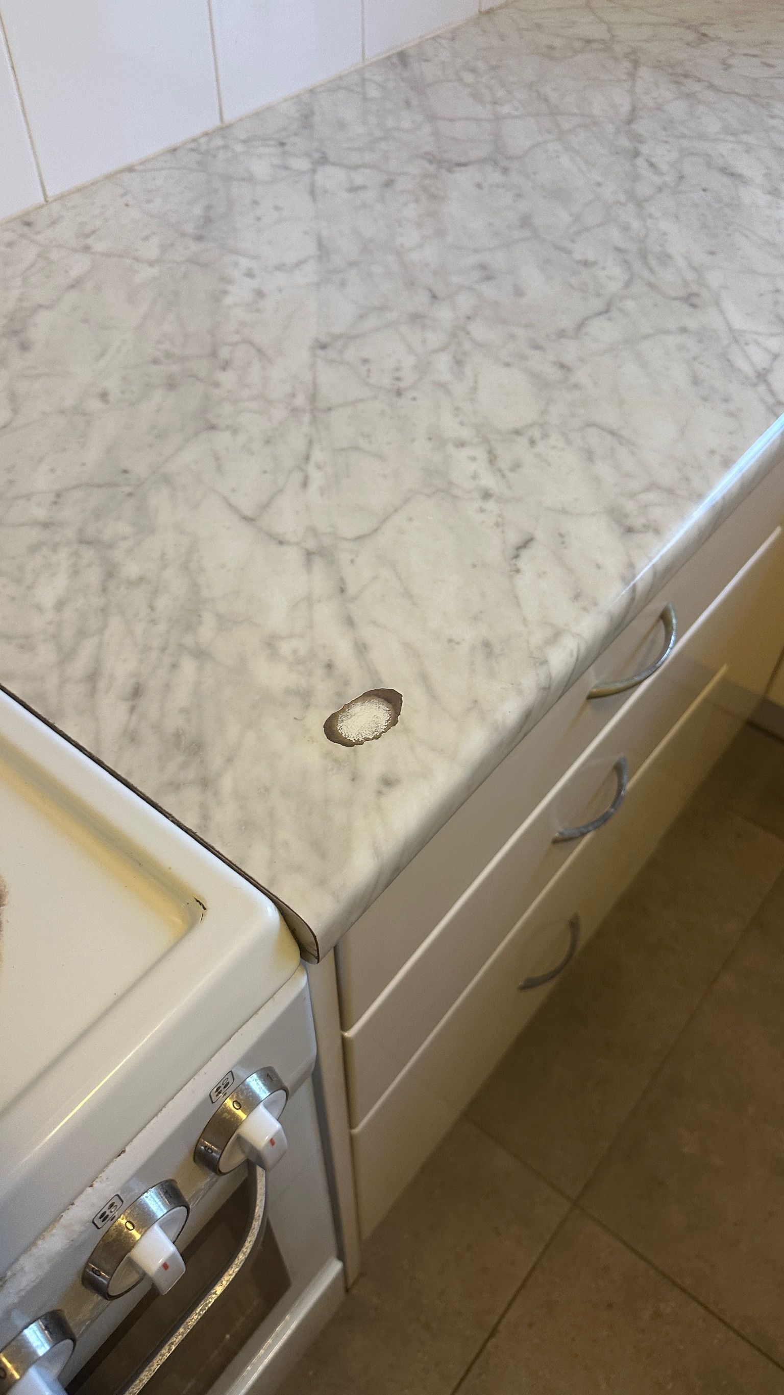 Laminate benchtop repaired — before and after comparison