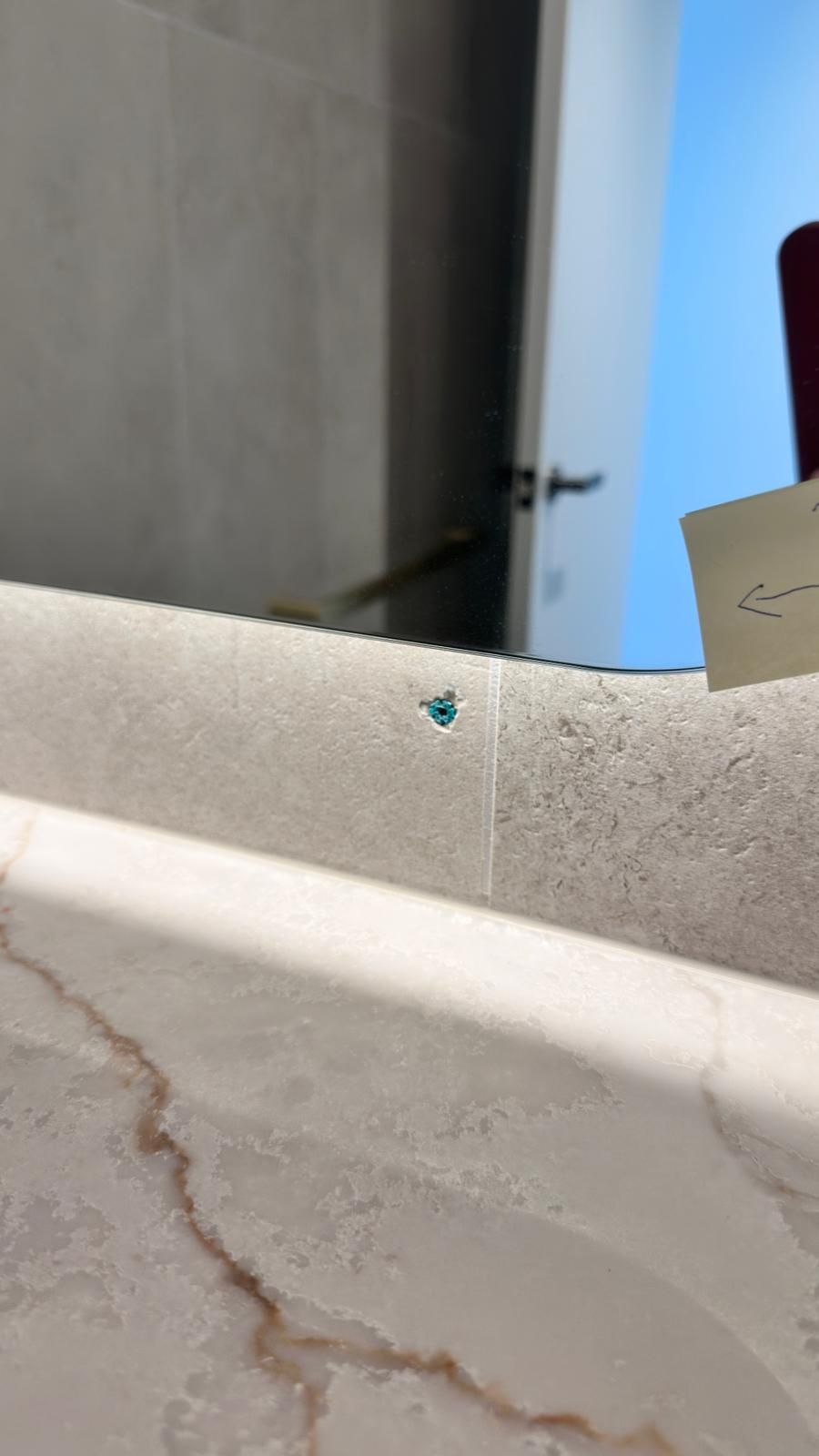 Tile wall repaired — before and after comparison