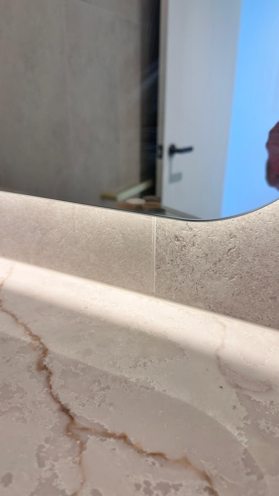 Tile wall repaired — before and after comparison
