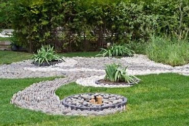 Stone walkway on lawn