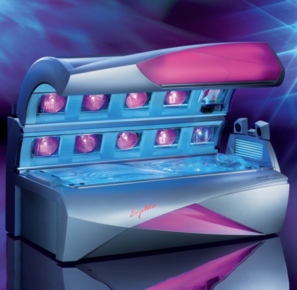Tanning bed with pink and blue lights, angled design, in a studio setting.