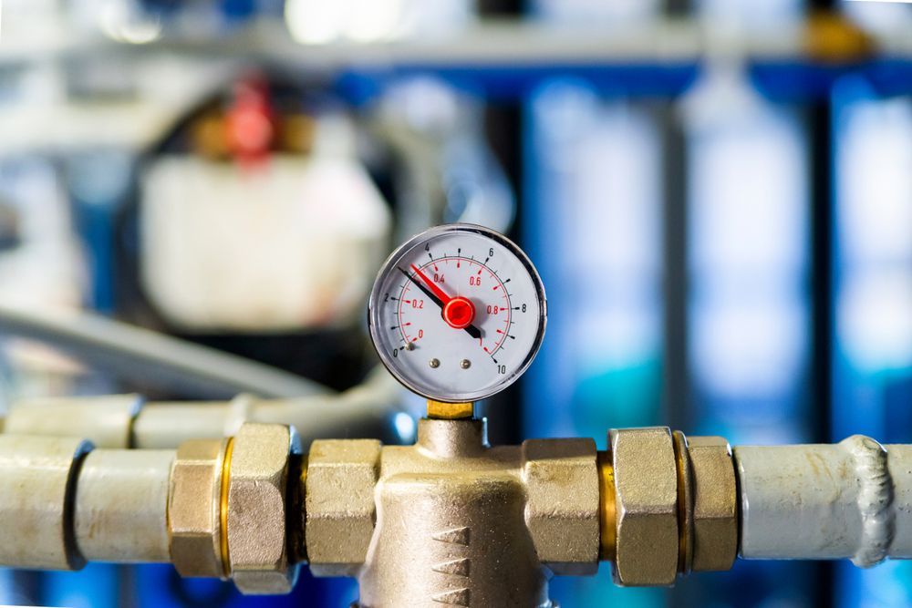 A Close Up Of A Pressure Gauge On A Pipe — CG Plumbing & Drainage In Singleton, NSW