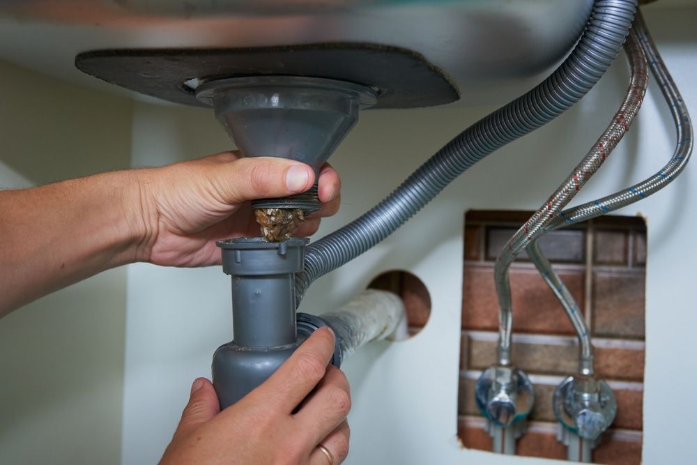 Dirt Residues Obstructing Pipes, Requiring Professional Plumbing and Drainage Services — CG Plumbing & Drainage In Singleton, NSW