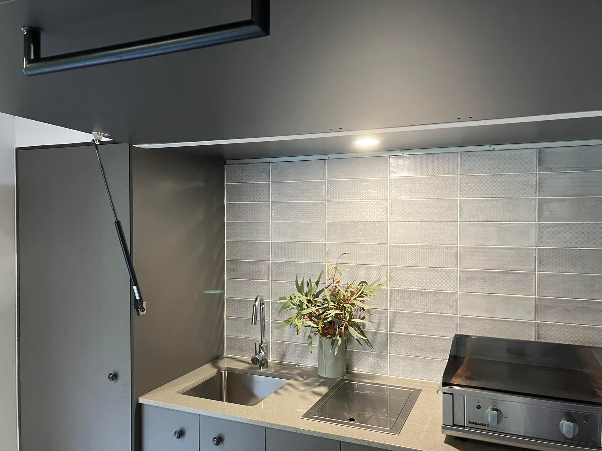Gray Kitchenette with Sink, Stove, Backsplash, and Overhead Cabinet — Valley Cabinetmakers In Biloela, QLD 