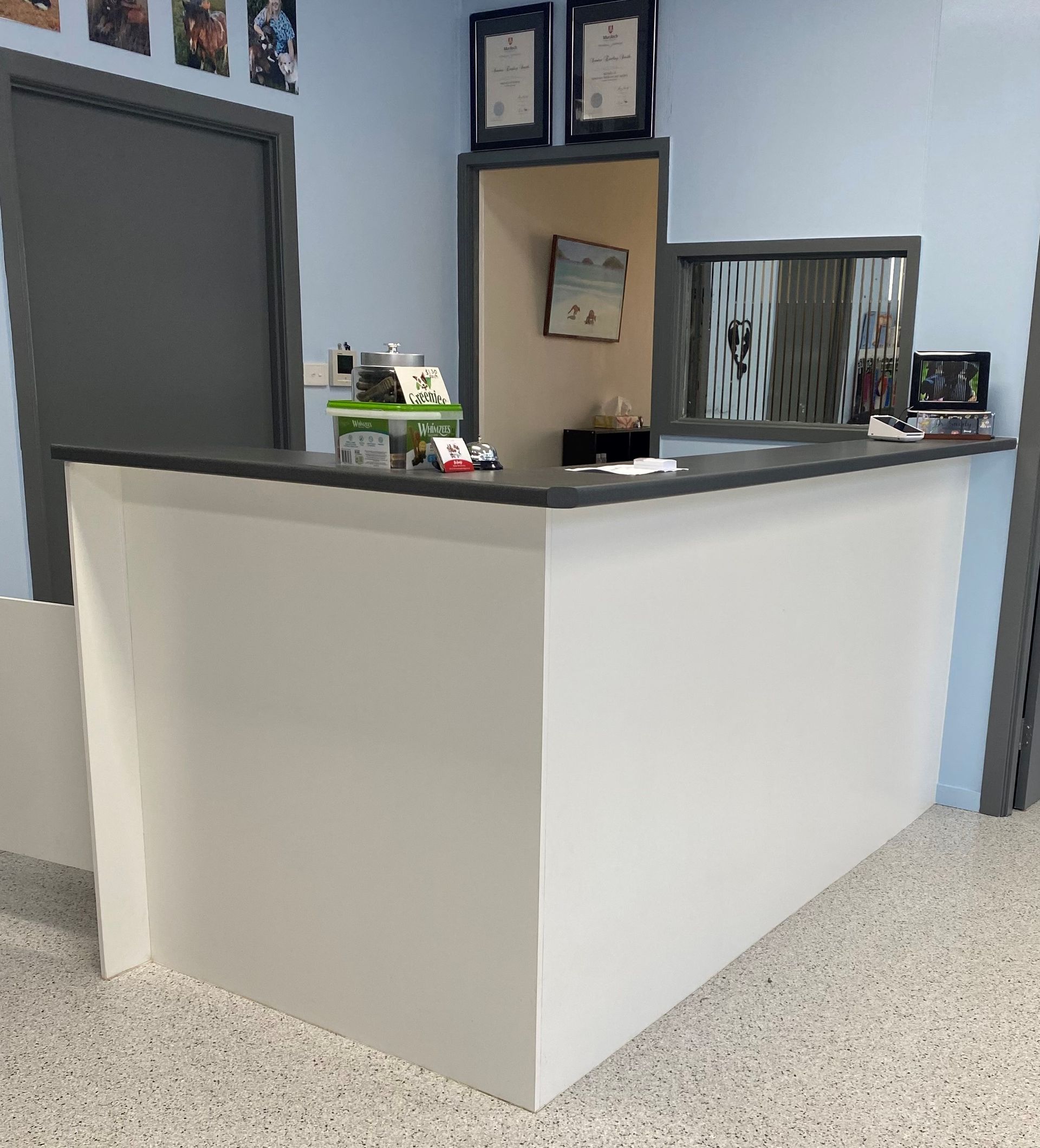 Modern Kitchen with White Countertops, Blue Cabinets, and Gray Stools — Valley Cabinetmakers In Biloela, QLD 