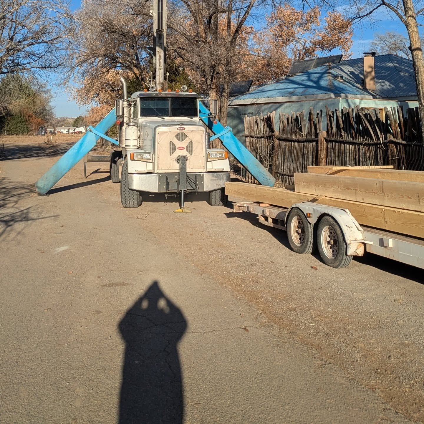 A truck with the letter m on the front of it