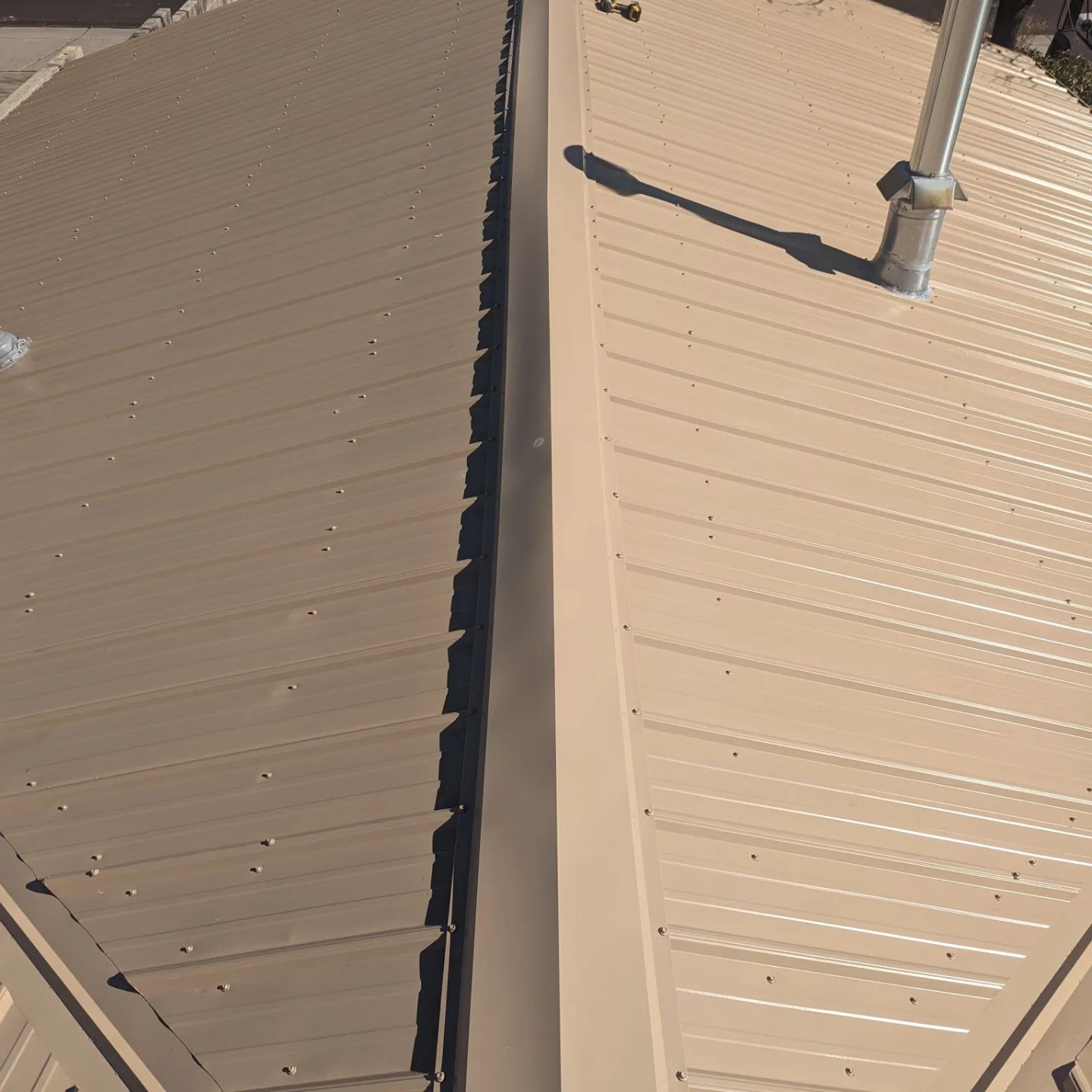 A roof with a chimney on top of it